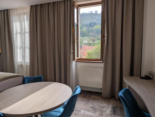 Hotel Galant Mikulov - Tap to explore photos