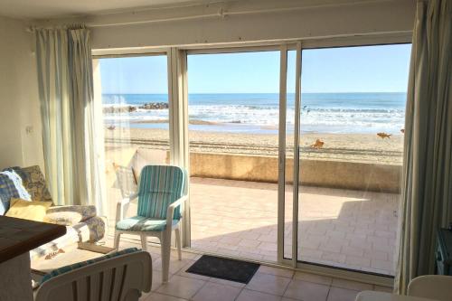 Appartement pieds dans l'eau avec terrasse