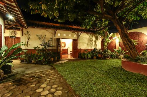 Griya Langen Guesthouse - 정원