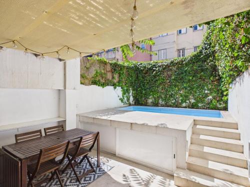 Cozy 1BR, Private Terrace & Pool – Estrela | By Airnest, Lisbon