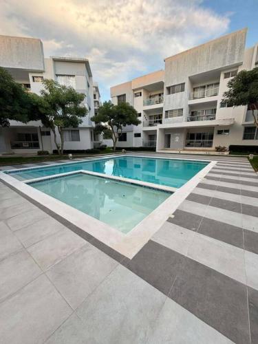 Tropical 2BR Private Beach Access Pool Gated - image 2