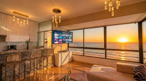 "Oceanfront 3BR, Home Office, Pool, Gym, Sauna, BBQ, Fast Wifi, Play area and Free Parking"