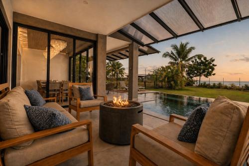 Luxury Beachfront Estate w Private Chef, Full StaffConcierge Resort Amenities in Playa Flamingo