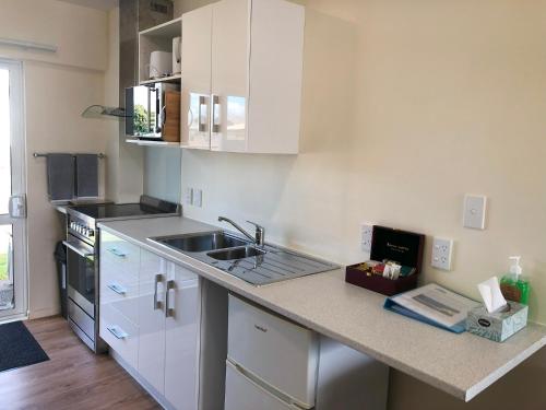 virtuve, Twin Coast Adventures Motel & Cycle Hire in Kaikohe