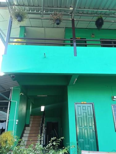 Exterior view, Shamrock Apartments in Wiang