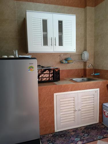 Kitchen, Shamrock Apartments in Wiang