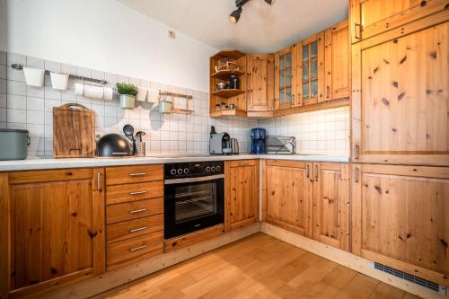 kuchyně, Waterkieker Jabel - Ferienhaus mit Sauna & Steg in Jabel