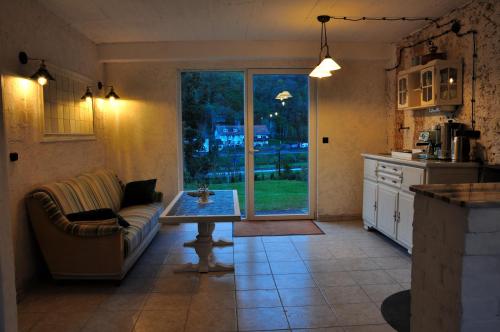 Jagatud salong / TV-ala, Ferienhaus Rosengarten Mürlenbach (Ferienhaus Rosengarten Murlenbach) in Murlenbach