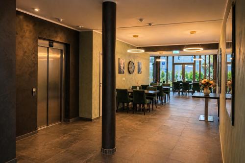 Ресторан, Munique Hotel Unterschleißheim in Unterschleissheim