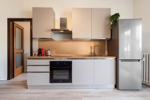 Family Apartment vicino Milan, Fiera & MXP - 4 Ospiti - Culla & Seggiolone in San Vittore Olona