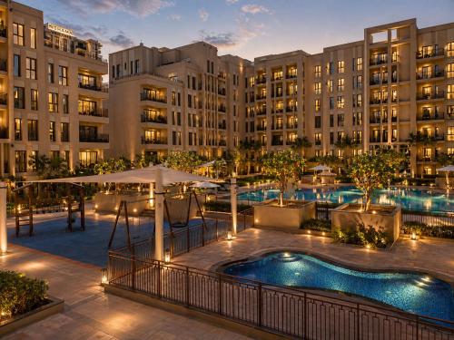 Bareez Bliss Retreat Elegant 2BR with Balcony, Pool & Park View, Dubai