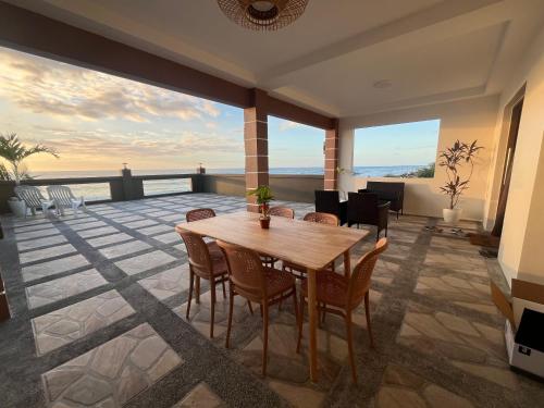 Beachfront Studio with Cozy and Spacious Balcony in Santa Lucia