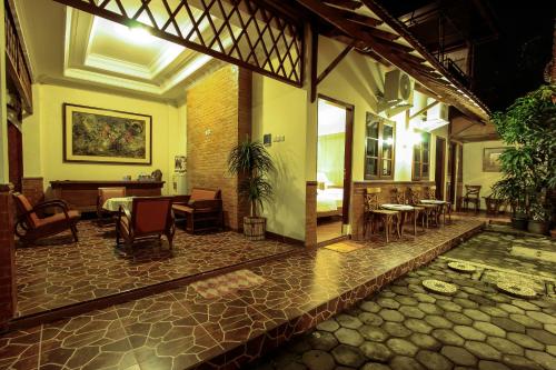 Griya Langen Guesthouse - 정원