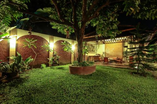 Griya Langen Guesthouse - 정원