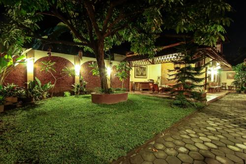 Griya Langen Guesthouse - 정원