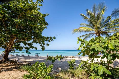 Beach, Outrigger Surin Beach Resort in Surin