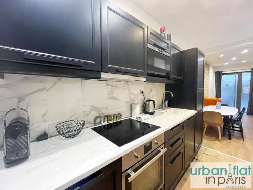 UrbanFlat 52 - Paris Center Fresh Apartment - image 2