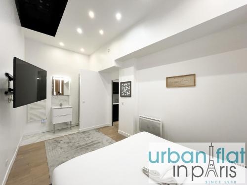 UrbanFlat 52 - Paris Center Fresh Apartment - image 14