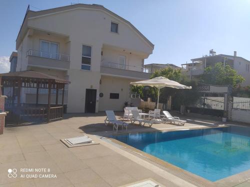 Spacious 4BR and 2BA Private Pool Villa in Didim in Yalıköy (Aydin)