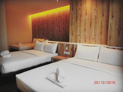 D Elegance Hotel Room Type - Premium Quadruple Room