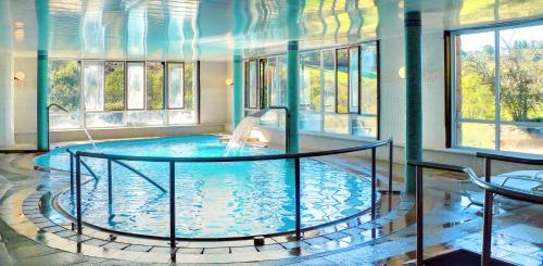 Swimming pool, Hotel Balneario Rio Pambre in Palas de Rey