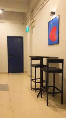 Shared lounge/TV area, City Backpackers - Hostel and Private Rooms in Clarke Quay