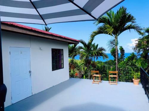 The Coconut Palm Villa ~ Ocean View Suite ll in โคโคนัทโกรฟ