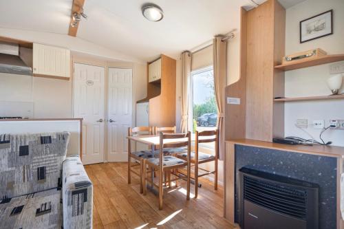 Chalet de Zwaan op camping Oudesluis in Schagen