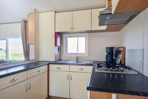 Chalet de Zwaan op camping Oudesluis in Schagen