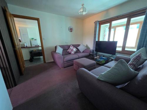 Woodlands Cottage cottage sleeps 5 in Inchbae Lodge