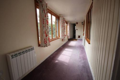 Woodlands Cottage cottage sleeps 5 in Inchbae Lodge