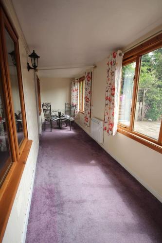 Woodlands Cottage cottage sleeps 5 in Inchbae Lodge