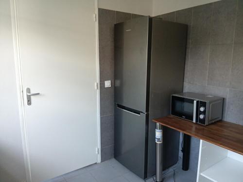App F4 Kone centre RDC Tel 7O 55 O8 in Kone
