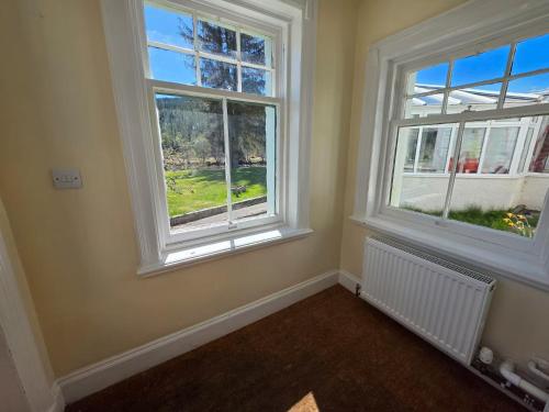 Mountain View - Sleeps 4 - Garden - Pet Friendly in Inchbae Lodge