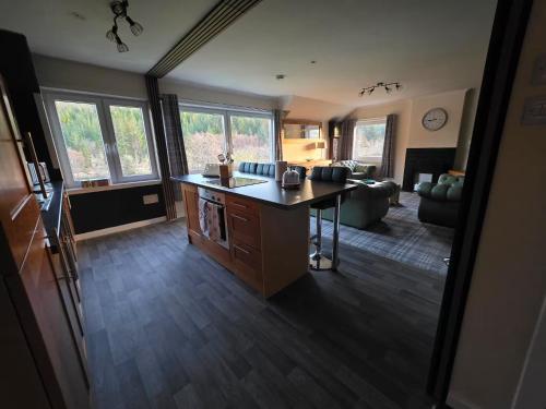 Highlands - River View - Apt - Sleeps 4 - Garden in Inchbae Lodge