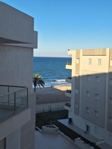 Résidence Costa G52, vue mer, piscine, accès direct plage (Residence Costa G52, vue mer, piscine, acces direct plage) in Chatt Mariem