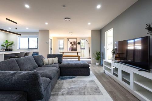 Spacious Family Home Near Airport w Kids Playroom – khách sạn tại Papanui