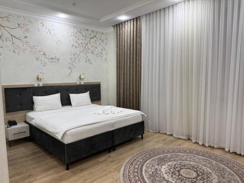 STATUS HOTEL in Qarshi