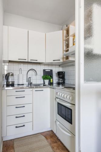 Kitchen, Peaceful & Bright Studio with Balcony in Green Etela-Haaga in Haaga