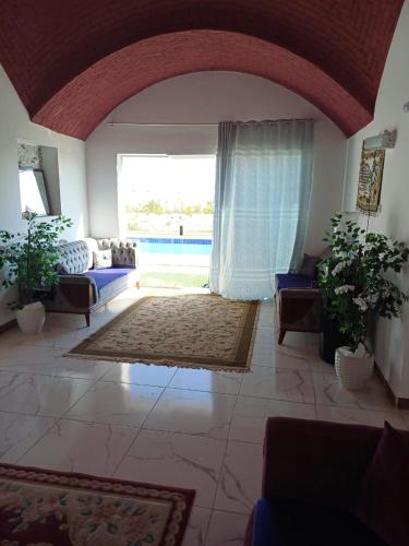 فيلا شاليه مستقل بالريف الاوربى بحمام سباحه 3 غرف 2 حمام بمدينة سفنكس in Sheikh Zayed City