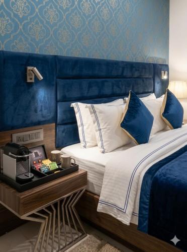 Bed, Banana Tree Hotel & Banquets At Sahibabad in Ghaziabad