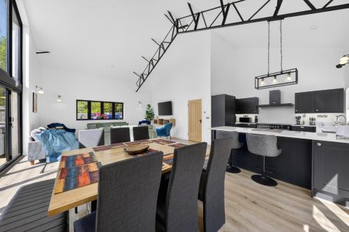 Luxury Norfolk Barn for 12 with Hot Tub , Games Room & EV Car Port in Weston Longville