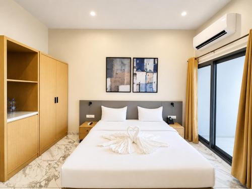 Ixoras Hotel Lemba in 金夏沙