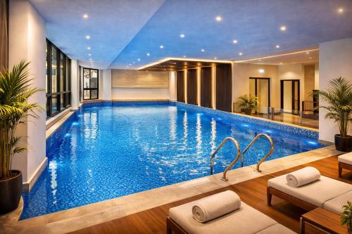 Aurum Signature Premium Apartments Gulberg Lahore - Pool Gym & Cinema - image 8