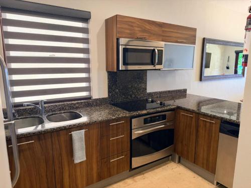 Oceanfront Condo a Block Off 5th in Heart of Playa in Playa del Carmen, Mexico
