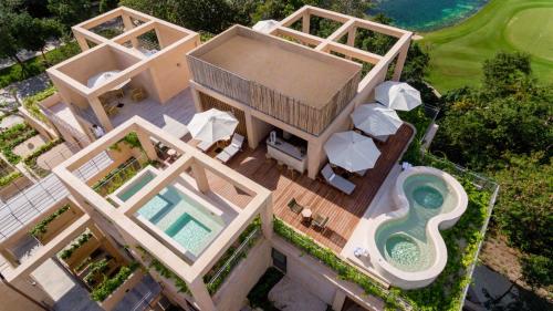 Corasol 2 Bedroom Condo in Playa del Carmen Beach Club Access 7 Min to Beach Pools Gym Golf