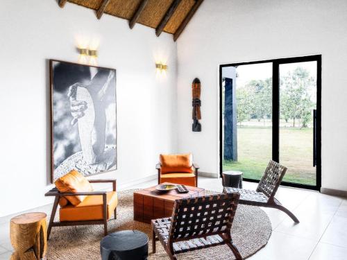 Koplietošanas atpūtas telpa ar TV, Bon Hotel Crown Forest in Agona Swedru