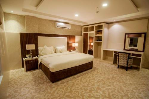Elite Suites Hotel - Al Malqa - Tap to explore photos