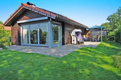 Blockhaus - grosse Terrasse mit Strandkorb und W-LAN in Damp, Deutschland