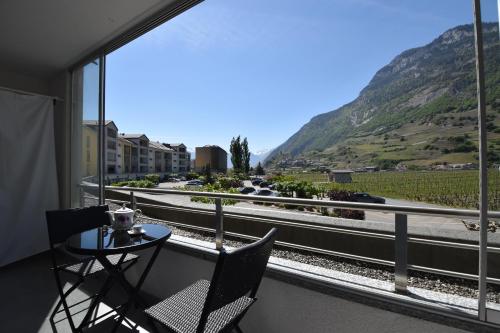 Appartement ensoleillé 4 personnes à Saillon à 100 mètres des bains